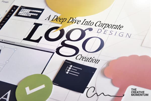 A Deep Dive Into Corporate Logo Design. Desk covered in tools and icons: green check, yellow word bubble, gridlined paper.