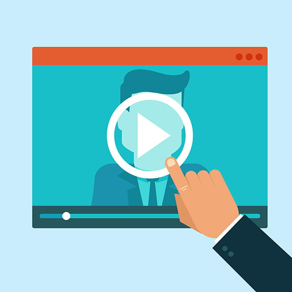 SEO trends in 2021 - videos will remain a popular way to grab attention and boost SEO. Finger selects video "play" button.
