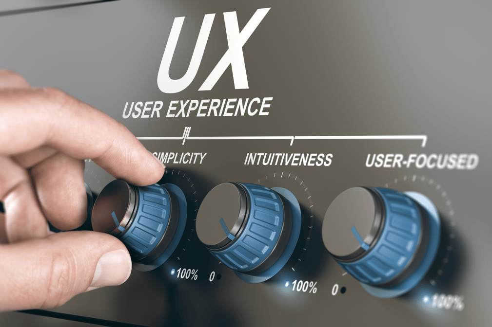 Hand adjusting UX controls labeled simplicity, intuitiveness, and user-focused