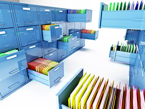 Pillar pages organize your content so that visitors don't have to hunt it. Large file cabinets with some drawers pulled out.