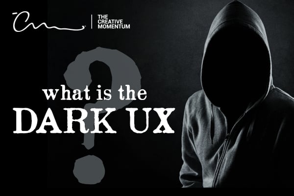 What is the dark ux? Empty black hoodie faces the camera, on black background with question mark.