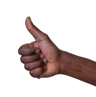 Good examples of ethical social media marketing deserve a thumbs up. A hand displays the thumbs up sign.