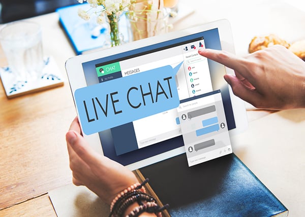 Engaging visitors with live chat can boost your ecommerce sales - Laptop screen with live chat