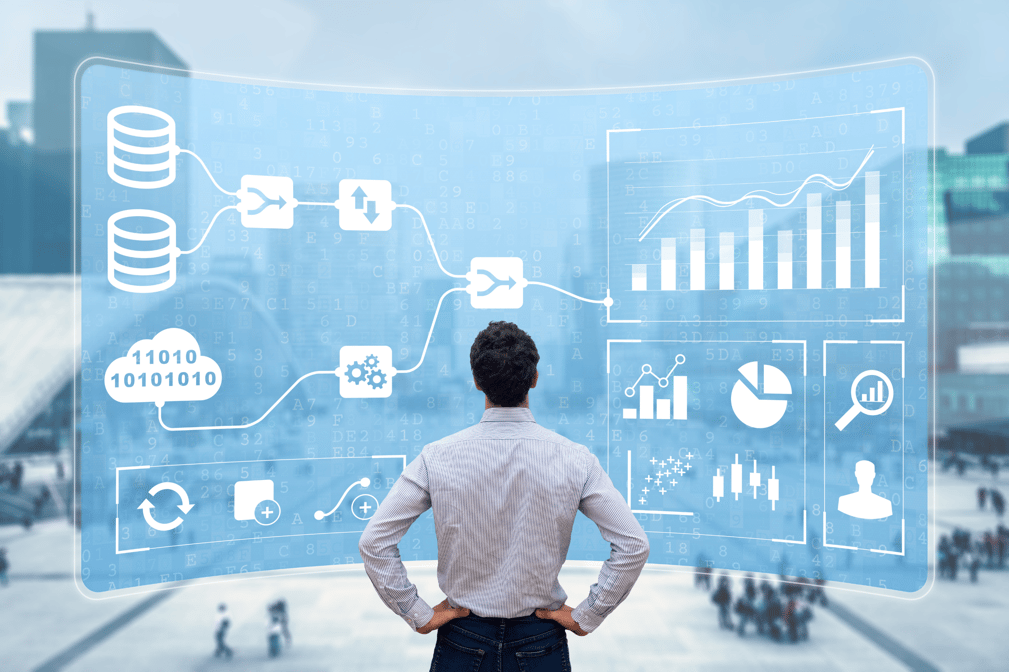 A marketer reviewing data on a futuristic digital display